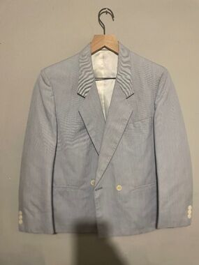 Jos A Bank woman’s size 10 double breasted light blue jacket and skirt